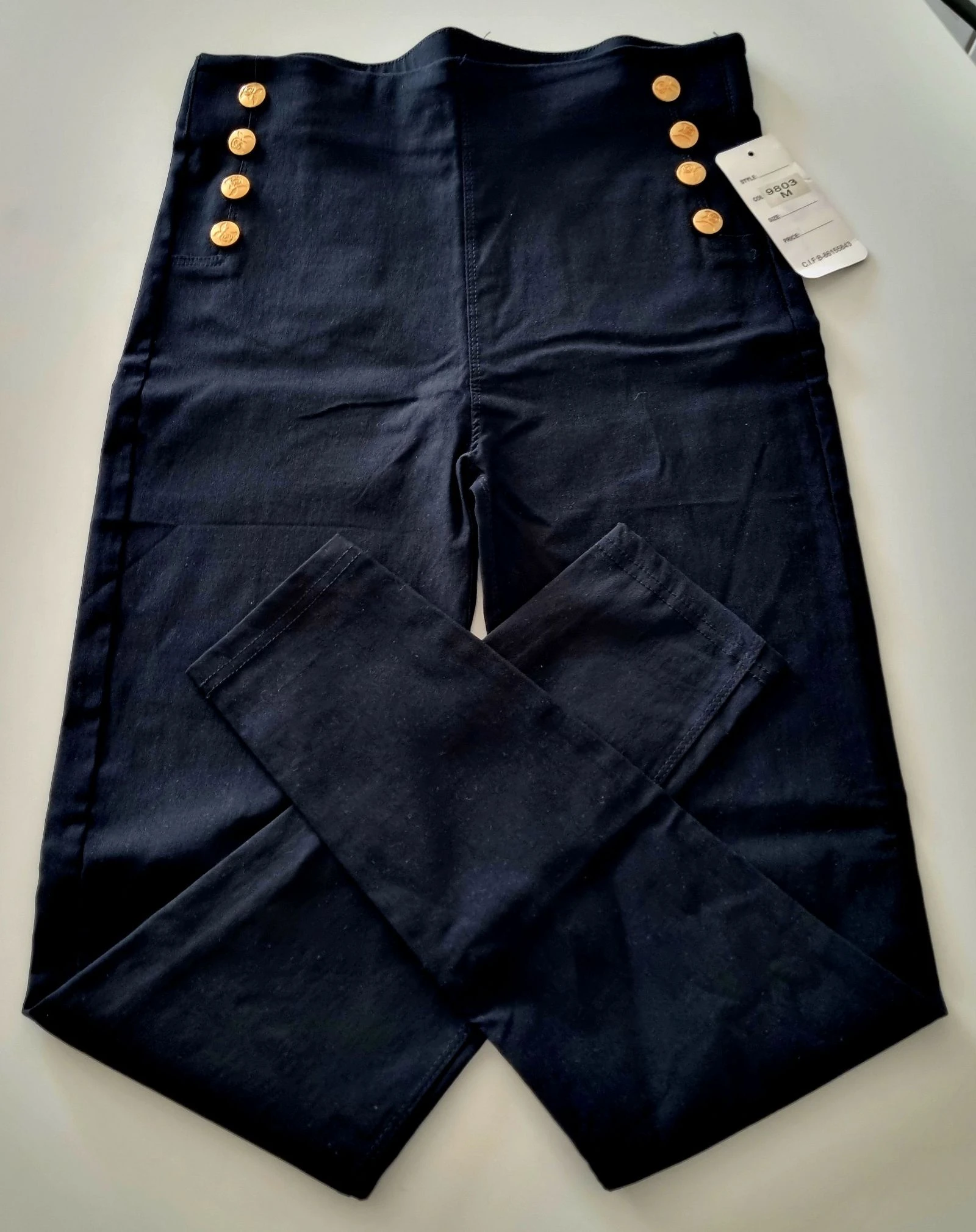 Calças/leggings pretas, com 8 botões dourados à frente. M – photo 2